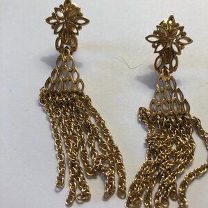 Vintage Monet gold toned clip on earrings filigree top and triangle w/tassels